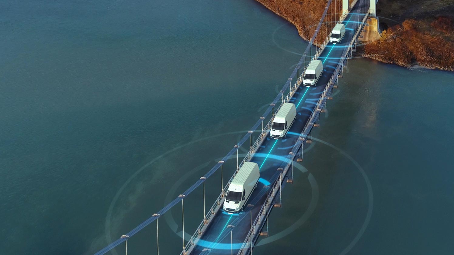 Two white commercial trucks balancing on each side of a scale